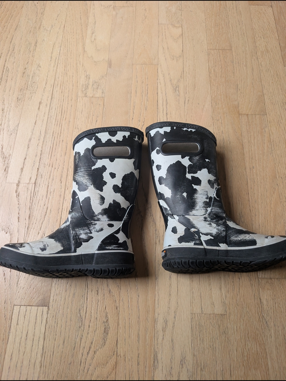 Bogs Kids Cow-Print Rain & Snow Boots in Black and White